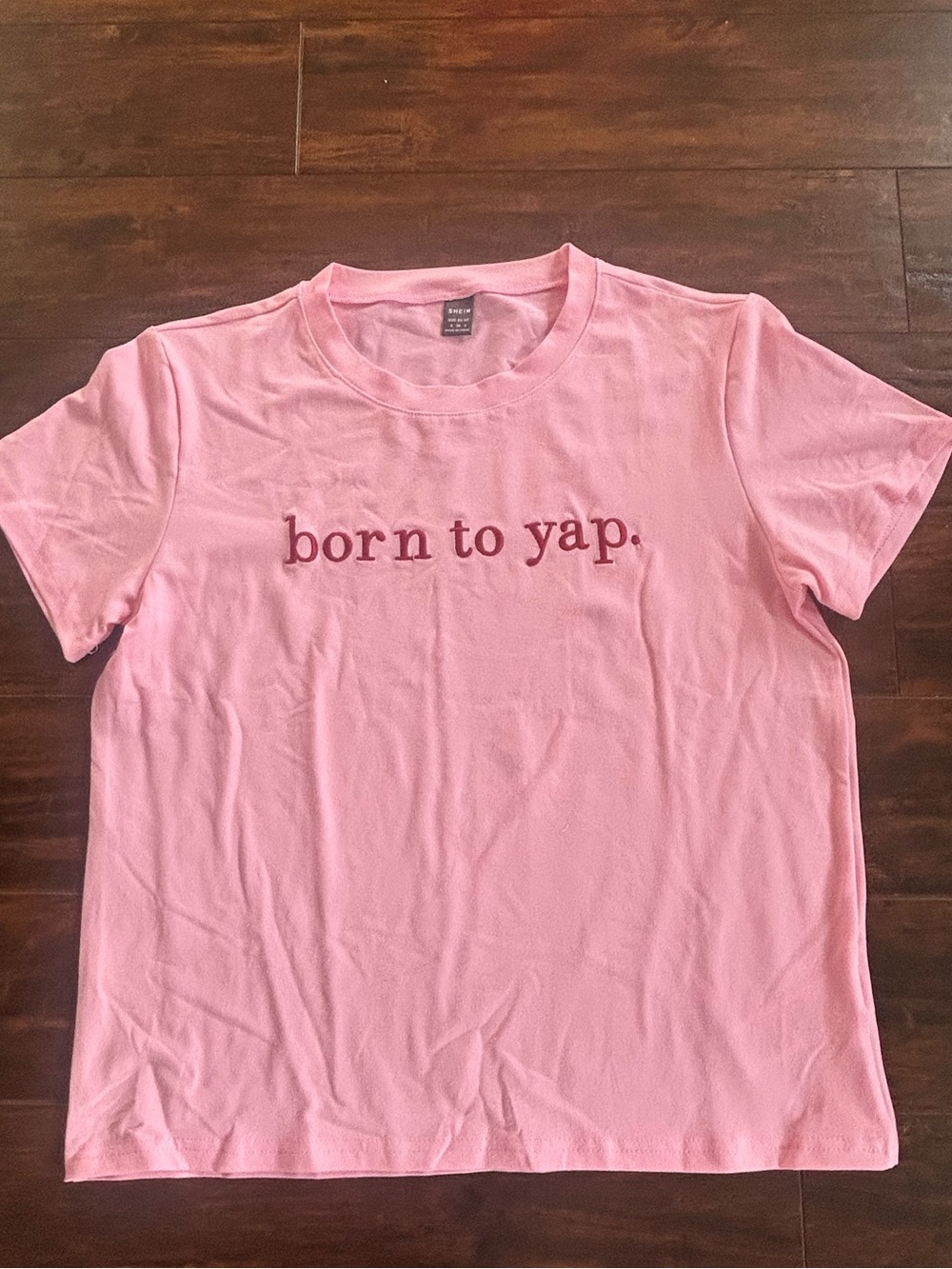 Soft Pink Embroidered “Born to Yap.” Graphic Tee NWOT (Loose Fit)